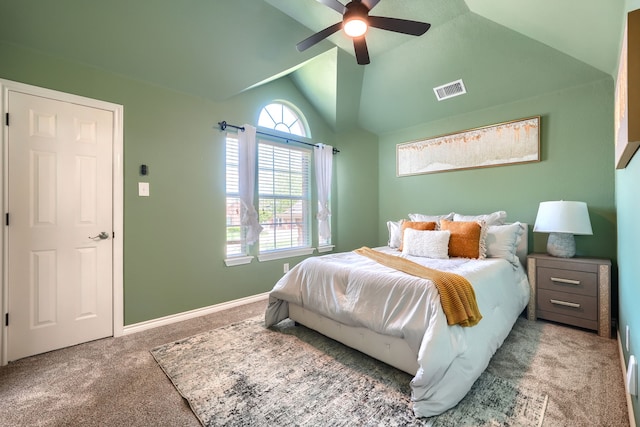 bedroom with carpet floors, vaulted ceiling, baseboards, and a ceiling fan