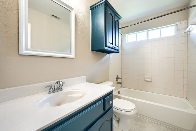 full bathroom featuring toilet, tub / shower combination, and vanity