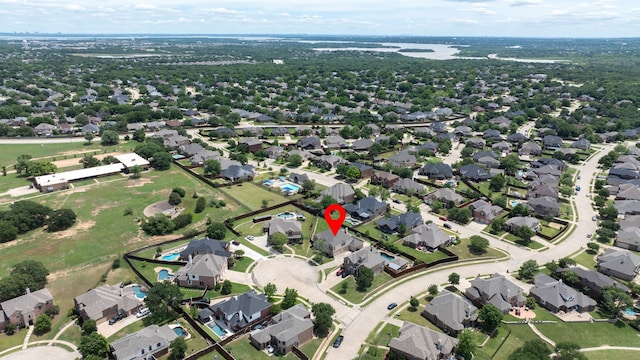 aerial view of property's location featuring nearby suburban area