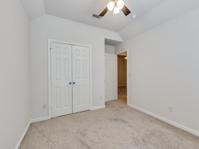 323 Emma Call Ct, Decatur, TX 76234 - unfurnished bedroom featuring carpet floors, baseboards, vaulted ceiling, and a closet