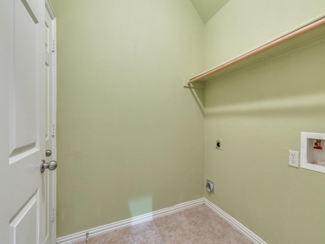 323 Emma Call Ct, Decatur, TX 76234 - clothes washing area featuring electric dryer hookup, baseboards, washer hookup, and light tile patterned floors
