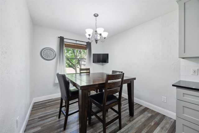 4204 Twilight Dr S, Benbrook, TX 76116 - dining room featuring dark wood finished floors, a chandelier, baseboards, and a textured wall