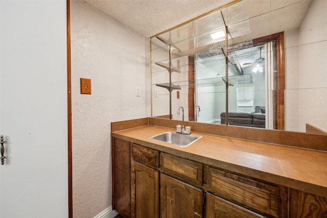 4204 Twilight Dr S, Benbrook, TX 76116 - indoor wet bar featuring a textured wall and a textured ceiling