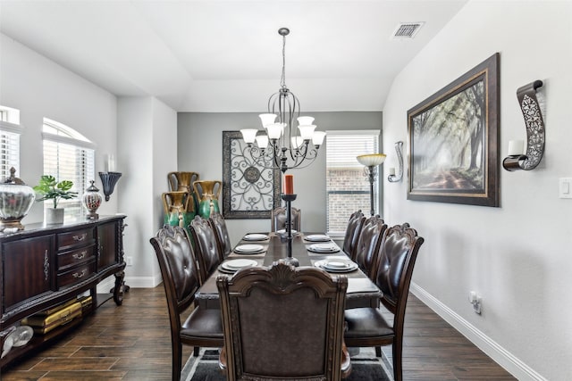 121 Quail Run Rd, Red Oak, TX 75154 - dining space featuring a chandelier, baseboards, dark wood-style flooring, and lofted ceiling