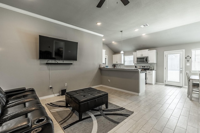 391 Paso Fino St, Waco, TX 76706 - living room featuring a ceiling fan, baseboards, light wood-type flooring, crown molding, and recessed lighting