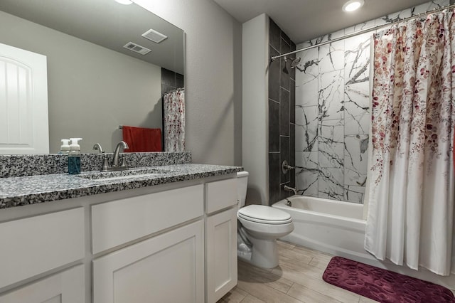 391 Paso Fino St, Waco, TX 76706 - bathroom with shower / bathtub combination with curtain, recessed lighting, toilet, vanity, and wood finished floors