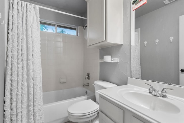 bathroom with shower / bath combo, toilet, and vanity