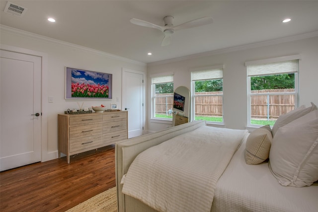 4719 Wateka Dr, Dallas, TX 75209 - bedroom with dark wood-type flooring, crown molding, recessed lighting, baseboards, and ceiling fan