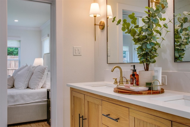4719 Wateka Dr, Dallas, TX 75209 - bathroom featuring ornamental molding and double vanity