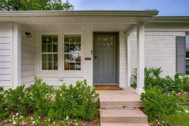 4719 Wateka Dr, Dallas, TX 75209 - property entrance featuring brick siding and a porch