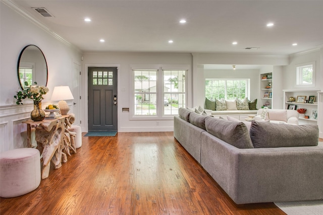 4719 Wateka Dr, Dallas, TX 75209 - living room featuring crown molding, wood finished floors, recessed lighting, and baseboards