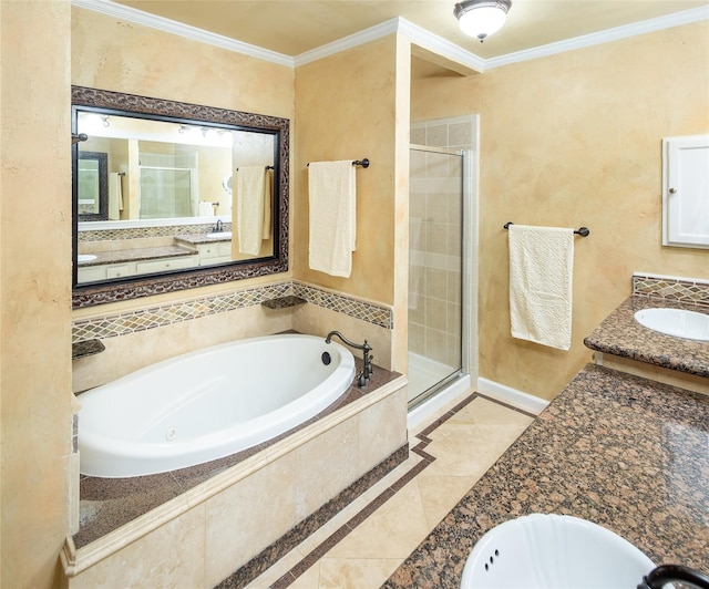 full bathroom featuring a stall shower, baseboards, a garden tub, vanity, and ornamental molding