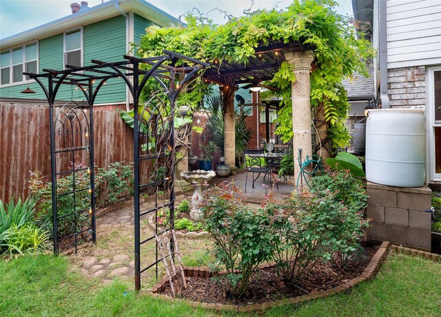 view of yard featuring fence and a patio