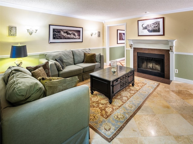 living area with crown molding, a textured ceiling, a fireplace with flush hearth, baseboards, and light stone finish flooring