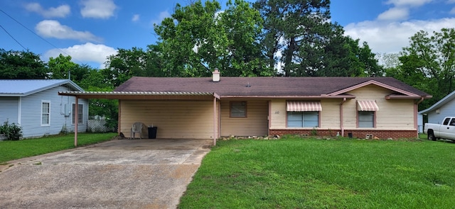 110 Russell Dr, Sulphur Springs, TX 75482 - ranch-style house featuring driveway, a front lawn, an attached carport, and a chimney