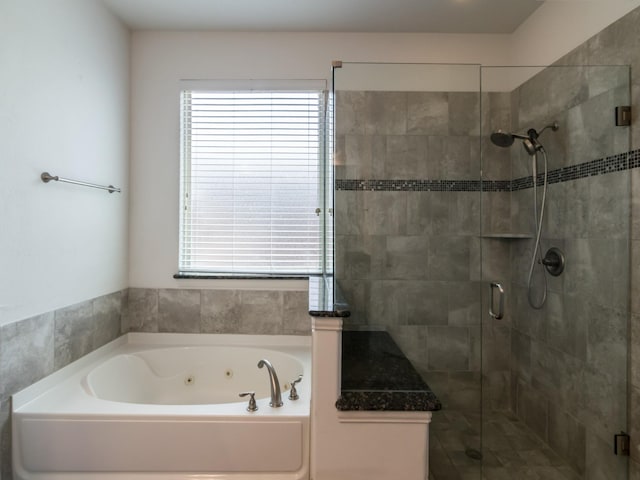 928 Freesia Dr, Little Elm, TX 75068 - bathroom featuring a jetted tub and a shower stall