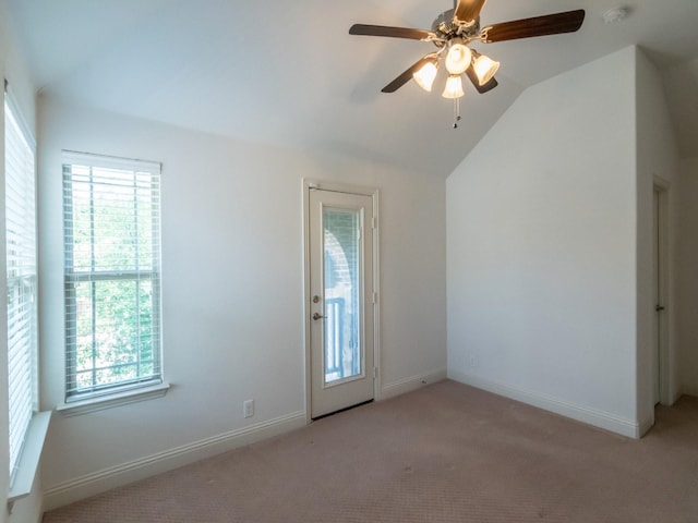 928 Freesia Dr, Little Elm, TX 75068 - unfurnished room featuring plenty of natural light, vaulted ceiling, and light carpet