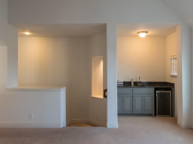 928 Freesia Dr, Little Elm, TX 75068 - indoor wet bar with light colored carpet and baseboards