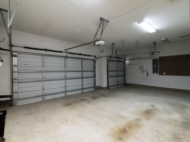 928 Freesia Dr, Little Elm, TX 75068 - garage with a garage door opener and electric panel
