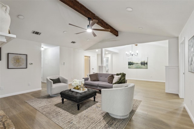 living area featuring light wood-style floors, a ceiling fan, a chandelier, baseboards, and recessed lighting