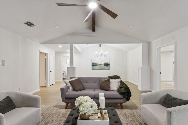 living room with light wood-type flooring, a chandelier, ceiling fan, recessed lighting, and baseboards