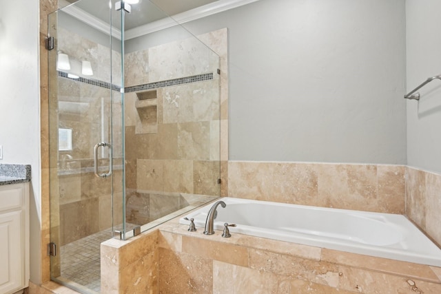 full bath featuring crown molding, a garden tub, and a stall shower