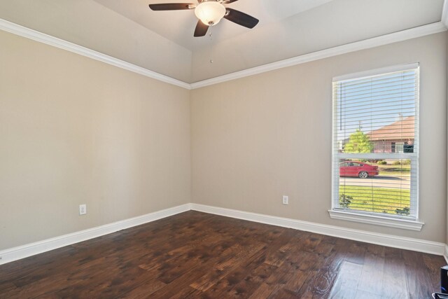 unfurnished room featuring a ceiling fan, dark wood-style floors, baseboards, and crown molding