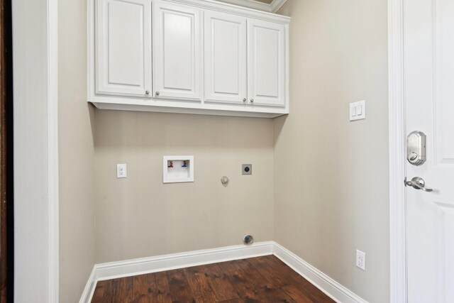 laundry room with cabinet space, electric dryer hookup, hookup for a washing machine, baseboards, and gas dryer hookup