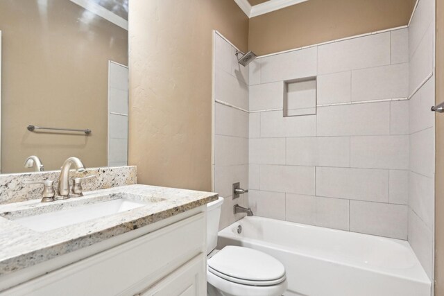 full bathroom featuring ornamental molding, toilet, shower / bath combination, and vanity
