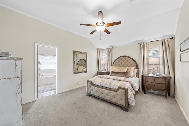 bedroom featuring multiple windows, carpet flooring, crown molding, baseboards, and vaulted ceiling