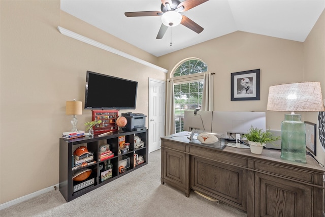 office area with a ceiling fan, light colored carpet, lofted ceiling, and baseboards