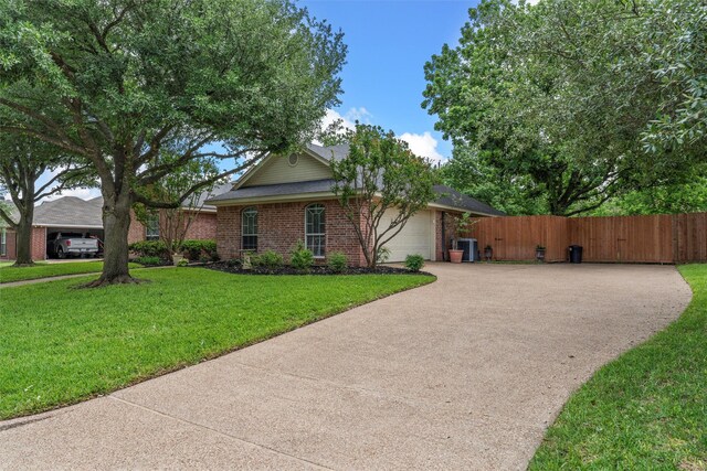 view of front facade featuring an attached garage, brick siding, and concrete driveway