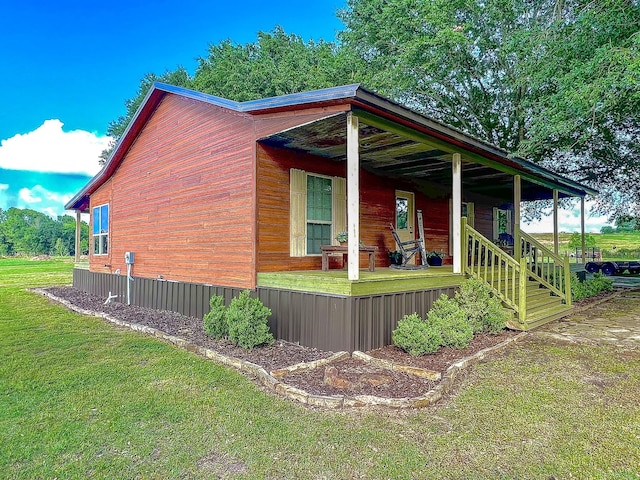 6861 County Road 4710, Larue, TX 75770 - view of property exterior featuring a yard and covered porch