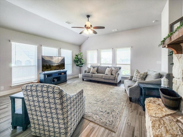 1152 Snowy Owl Dr, Alvarado, TX 76009 - living area featuring ceiling fan, wood finished floors, baseboards, and vaulted ceiling