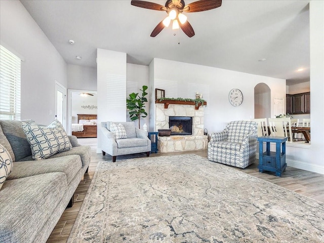 1152 Snowy Owl Dr, Alvarado, TX 76009 - living room with ceiling fan, wood finished floors, a fireplace, and baseboards