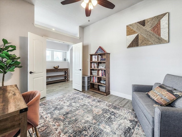 1152 Snowy Owl Dr, Alvarado, TX 76009 - sitting room featuring ceiling fan, wood finished floors, and baseboards