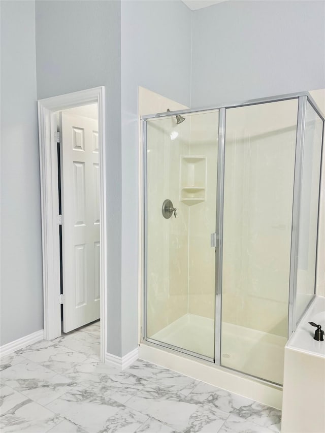 2632 Lake Ridge Dr, Little Elm, TX 75068 - bathroom with marble look tiles and a stall shower