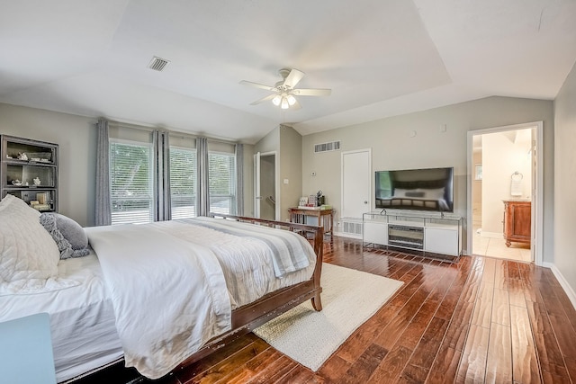 4020 Kerr Ct, Farmers Branch, TX 75244 - bedroom featuring dark wood-style floors, lofted ceiling, baseboards, and a ceiling fan