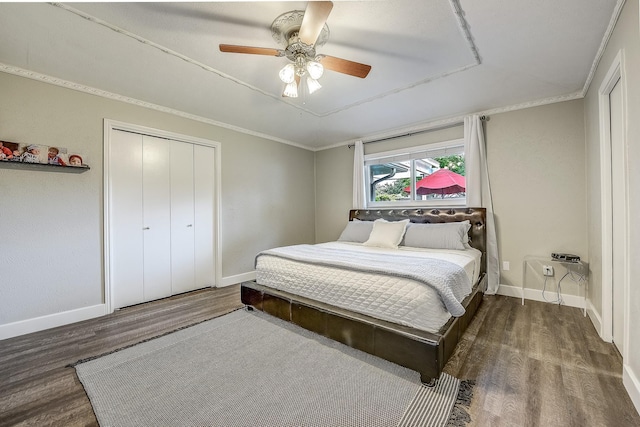 4020 Kerr Ct, Farmers Branch, TX 75244 - bedroom with wood finished floors, baseboards, a closet, a ceiling fan, and crown molding