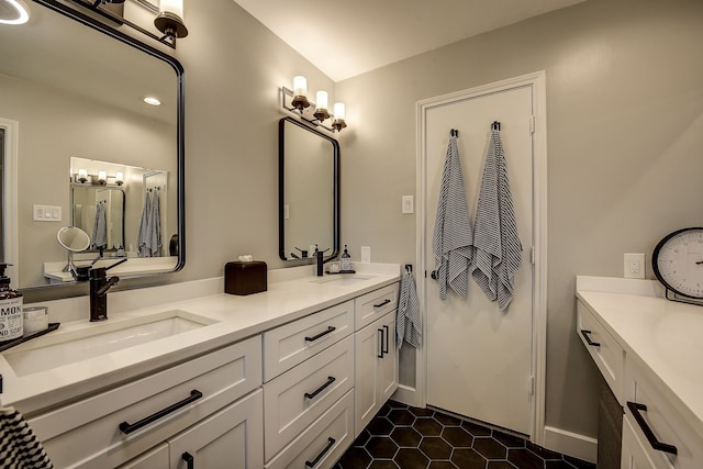 4020 Kerr Ct, Farmers Branch, TX 75244 - full bathroom featuring double vanity and tile patterned floors