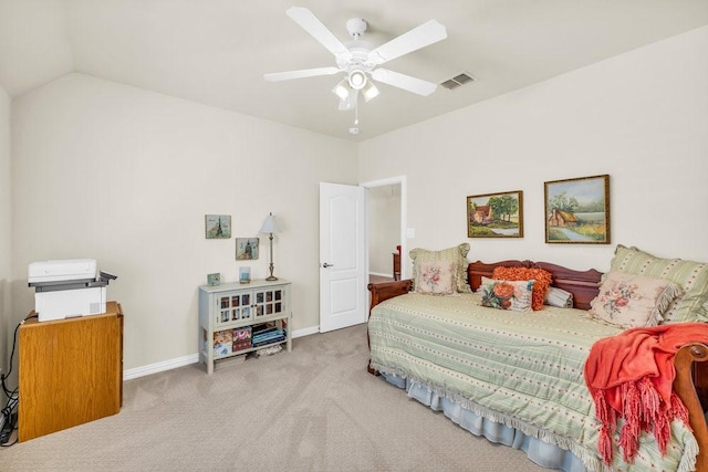 carpeted bedroom with baseboards, vaulted ceiling, and ceiling fan