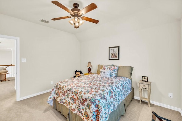bedroom with light colored carpet, baseboards, lofted ceiling, and a ceiling fan