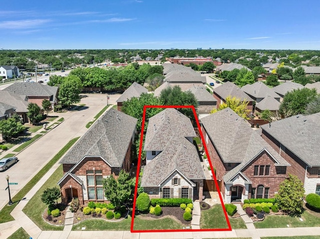 aerial perspective of suburban area with property boundaries highlighted