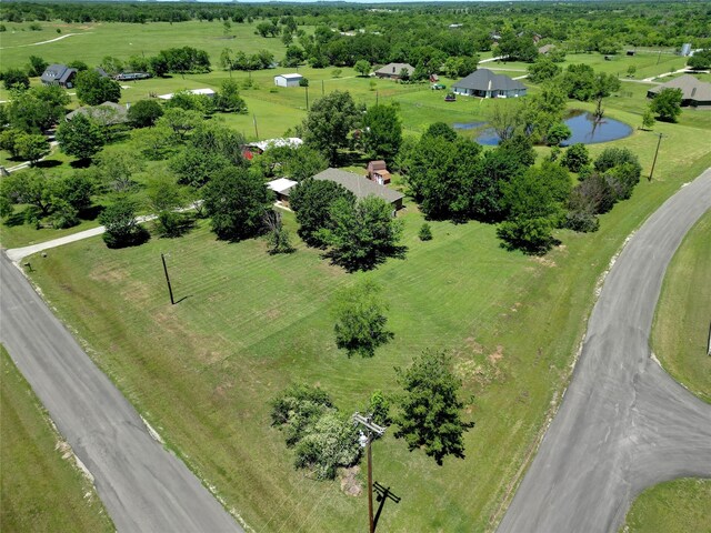 118 Brangus Ct, Paradise, TX 76073 - home office with light wood-style floors and wooden walls