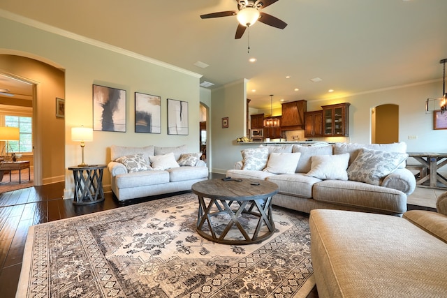 103 Fireside Ct, Mclendon Chisholm, TX 75032 - living area featuring arched walkways, ceiling fan, dark wood-style floors, ornamental molding, and recessed lighting