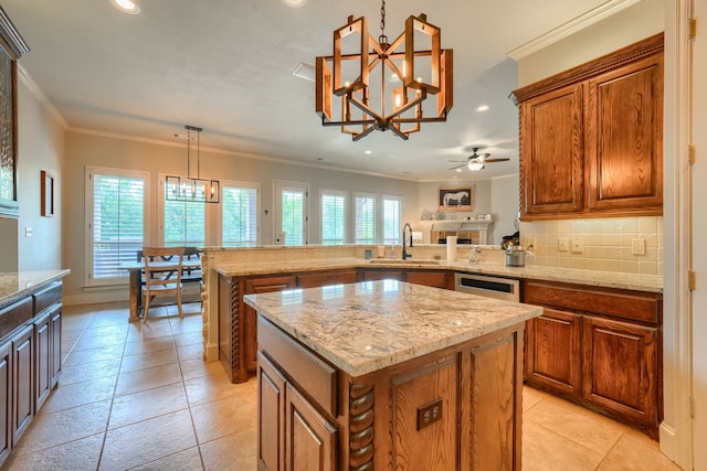 103 Fireside Ct, Mclendon Chisholm, TX 75032 - kitchen featuring a chandelier, recessed lighting, a ceiling fan, light stone counters, and crown molding