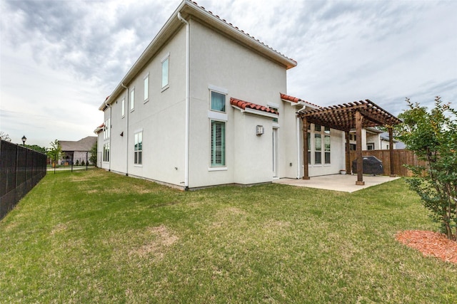 rear view of property featuring a pergola, a patio, and stucco siding