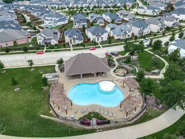 community pool featuring a residential view