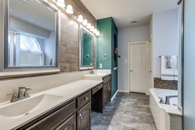1332 Needle Cactus Dr, Fort Worth, TX 76177 - bathroom featuring double vanity, a garden tub, and baseboards
