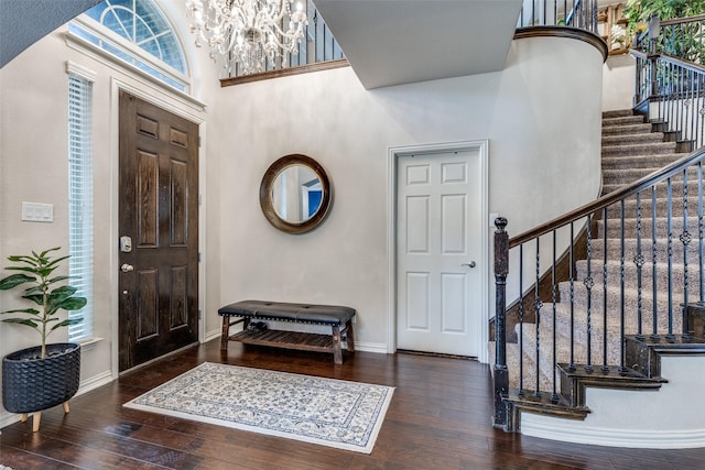 1332 Needle Cactus Dr, Fort Worth, TX 76177 - entrance foyer featuring a chandelier, stairs, a high ceiling, wood-type flooring, and baseboards